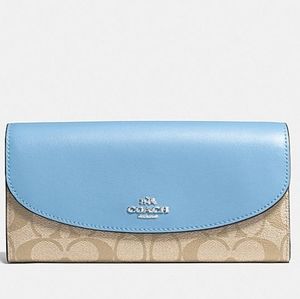 NWT SLIM ENVELOPE WALLET IN SIGNATURE CANVAS